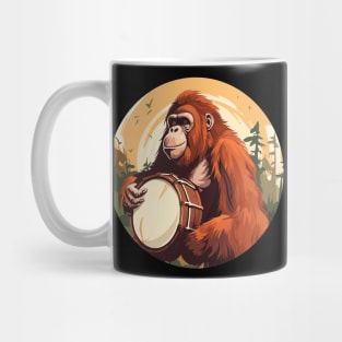 Orangutan playing drums Mug